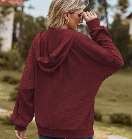 Autumn and winter new solid color pocket long sleeved loose hooded sweatshirt jacket
