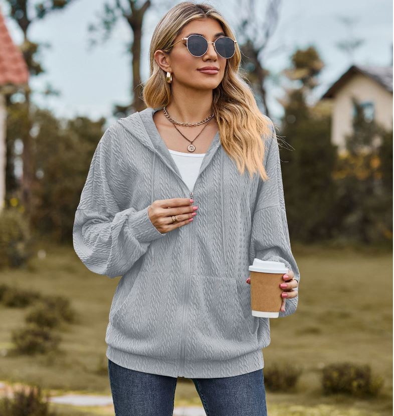 Autumn and winter new solid color pocket long sleeved loose hooded sweatshirt jacket