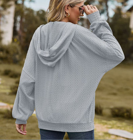 Autumn and winter new solid color pocket long sleeved loose hooded sweatshirt jacket