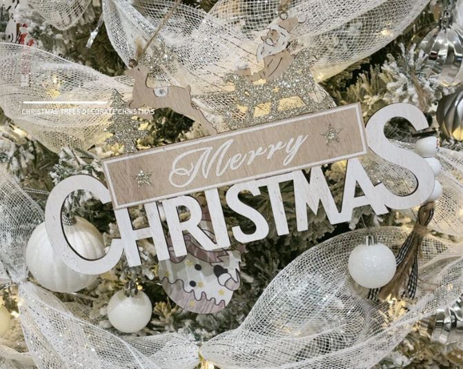 Flocked Christmas tree with dense falling snow