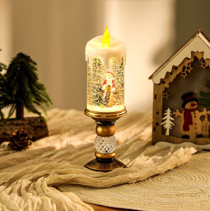 Christmas decoration with water filled candle ornaments