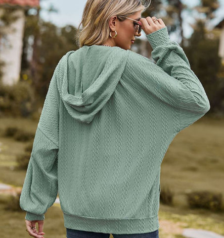 Autumn and winter new solid color pocket long sleeved loose hooded sweatshirt jacket