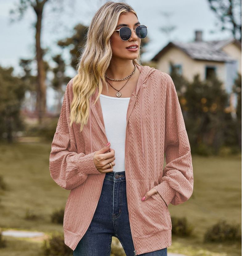 Autumn and winter new solid color pocket long sleeved loose hooded sweatshirt jacket