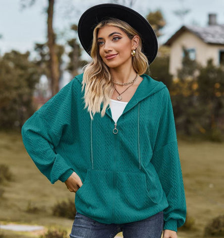 Autumn and winter new solid color pocket long sleeved loose hooded sweatshirt jacket