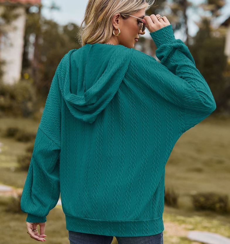 Autumn and winter new solid color pocket long sleeved loose hooded sweatshirt jacket