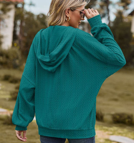 Autumn and winter new solid color pocket long sleeved loose hooded sweatshirt jacket